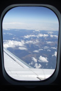 View-trough-airplane-window-in-flight1654